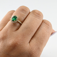 Colombian Emerald Oval 0.83 Carat Ring In 14K Yellow Gold With Accented Diamonds