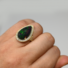 Ethiopian Black Opal Cab Pear Shape 7.47 Carat Ring In 14K Yellow Gold Accented With Diamonds