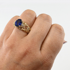 Nigerian Blue Sapphire Oval 3.58 Carat Filigree Ring with Diamond Accent in 14K Yellow Gold