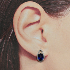Nigerian Blue Sapphire Oval 5.60 Carat Stud Earrings In 14K White Gold Accented With Diamonds