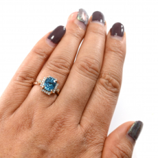Blue Zircon Oval 4.48 Carat Ring In 14K Rose Gold With Accented Diamonds