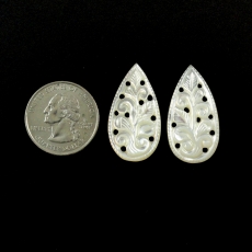 CARVED MOTHER OF PEARL 25.80 CARAT PEAR SHAPE 32X17X2MM