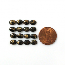 Copper Black Obsidian Cab Oval 7X5mm Approximately 9 Carat.