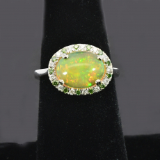 East-West Ethiopian Cab Opal Oval 2.03 Carat Ring In 14K White Gold Accented With White And Green Diamonds