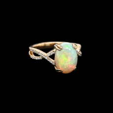 Ethiopian Opal Cab Oval 2.17 Carat Ring with Accent Diamonds in 14K Yellow Gold