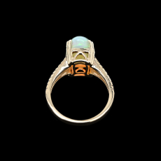 Ethiopian Opal Cab Oval 3.56 Carat Ring with Accent Diamonds in 14K Yellow Gold