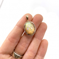 Ethiopian Opal Cab Oval 5.38 Carat Pendant with Accent Diamonds in 14K Rose Gold ( Chain Not Included )