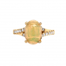 Ethiopian Opal Oval 1.05 Carat Ring In 14K Yellow Gold With Accented Diamond Ring