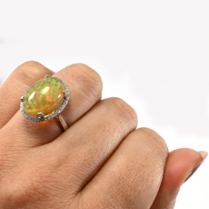 Ethiopian Opal Oval 5.68 Carat Ring In 14k White Gold Accented With Diamonds