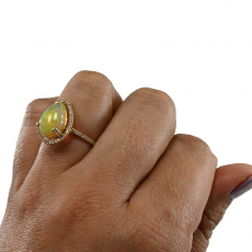 Ethiopian Opal Pear Shape 2.34 Carat Ring In 14K Yellow Gold With Accented Diamonds