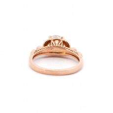 Moissanite Round 1.28 Carat Ring In Rose Gold With Accented Diamonds