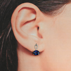 Nigerian Blue Sapphire East West Oval 4.88 Carat Stud Earring In 14K White Gold With Accented Diamonds