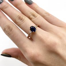 Nigerian Blue Sapphire Oval 1.08 Carat Ring with Diamond Accent in 14K Rose Gold