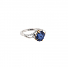 Nigerian Blue Sapphire Oval 2.58 Carat Ring in 14K Dual Tone (White/Yellow) Gold with Accent Diamonds