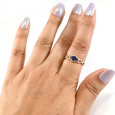 Nigerian Blue Sapphire Round 0.50 Carat Ring In 14K Yellow Gold Accented With Diamonds And Amethyst