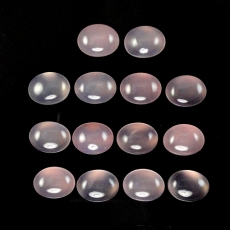 Pink Chalcedony Cab Oval  6X4mm Approximately 9 Carat.