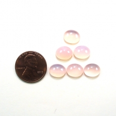 Pink Chalcedony Cab Oval 10X8mm Approximately 15 Carat.