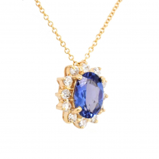 Tanzanite Oval 0.80 Carat Pendant in 14K Yellow Gold With Diamond Accents ( Chain Not Included )