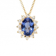 Tanzanite Oval 0.80 Carat Pendant in 14K Yellow Gold With Diamond Accents ( Chain Not Included )