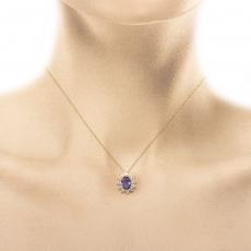 Tanzanite Oval 0.80 Carat Pendant with Accent Diamonds in 14k Yellow Gold ( Chain Not Included )