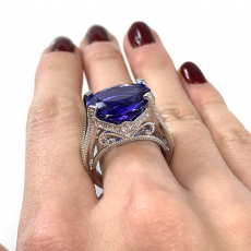 Tanzanite Oval 10.20 Carat Ring in 14K White Gold with Accent Diamonds