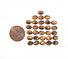 Tiger's Eye Cab Oval 7X5mm Approximately 25 Carat