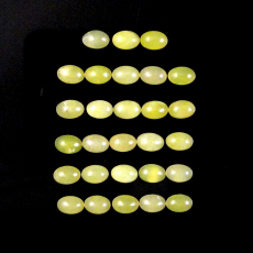 Yellow Serpentine Cab Oval 6X4mm Approximately 10 Carat