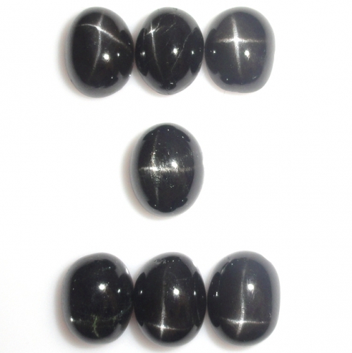 Black Star Diopside Oval 10x8mm Approximately 22 Carat.