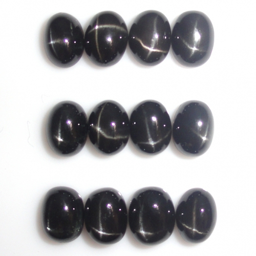 Black Star Diopside Oval 8X6mm Approximately 19 Carat.