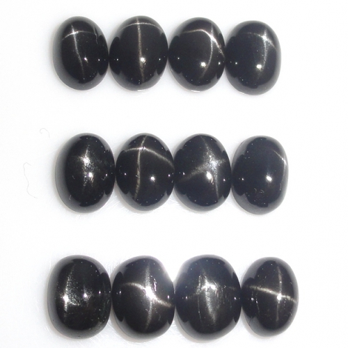 Black Star Diopside Oval 8X6mm Approximately 19 Carat.
