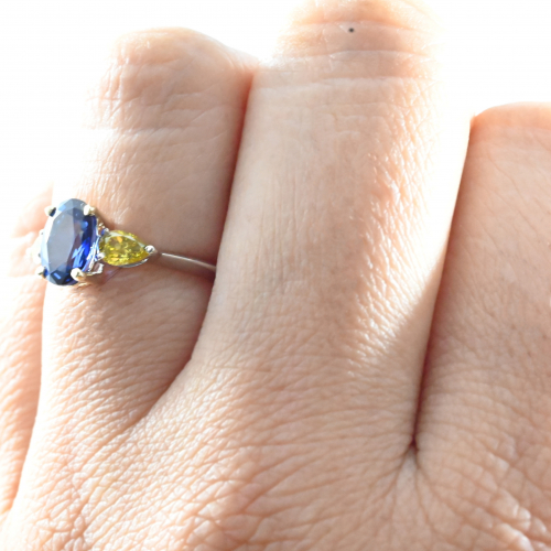 Blue Sapphire Oval 1.60 Carat Ring In Dual Tone(white/yellow) Gold Accented With Yellow Fancy Vivid Diamonds