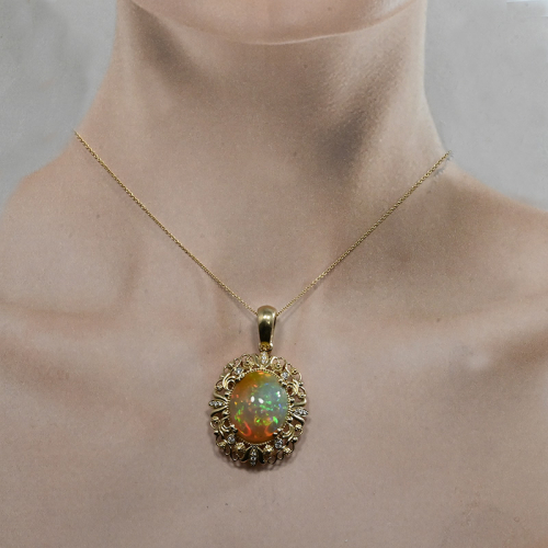 Ethiopian Opal Cab Oval 9.02 Carat Pendant In 14k Yellow Gold Accented With Diamonds