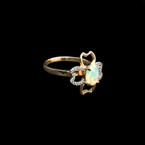 Ethiopian Opal Oval 0.68 Carat Ring In 14k Yellow Gold Accented With Diamonds