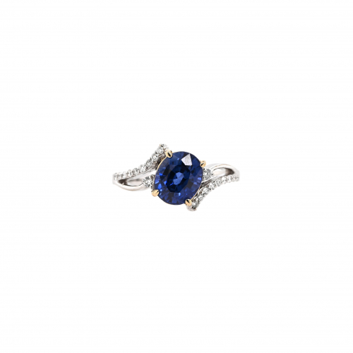 Nigerian Blue Sapphire Oval 2.58 Carat Ring in 14K Dual Tone (White/Yellow) Gold with Accent Diamonds